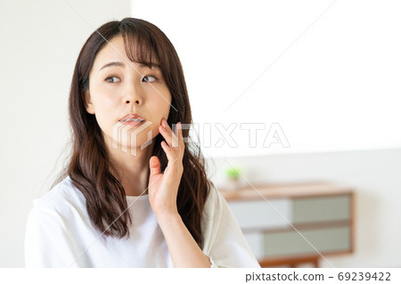 Beauty Portrait of a young woman who cares about her skin 69239422