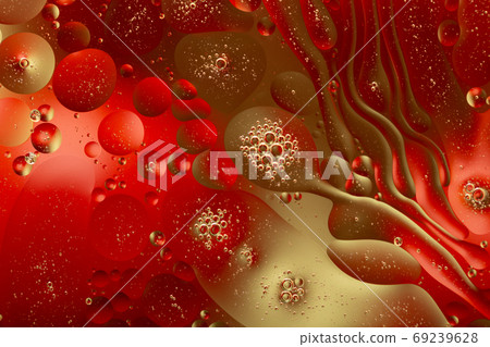 Close-up water and oil abstract in a rainbow lighting effect Close-up water and oil abstract in a rainbow lighting effect 69239628