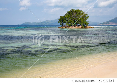 View from the main island to an another island in the near View from the main island to an another island in the near 69240131
