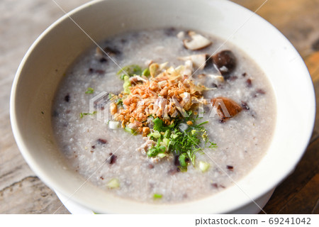 Mush or rice porridge - Boiled rice with pork shiitake mushrooms Mush or rice porridge - Boiled rice with pork shiitake mushrooms 69241042