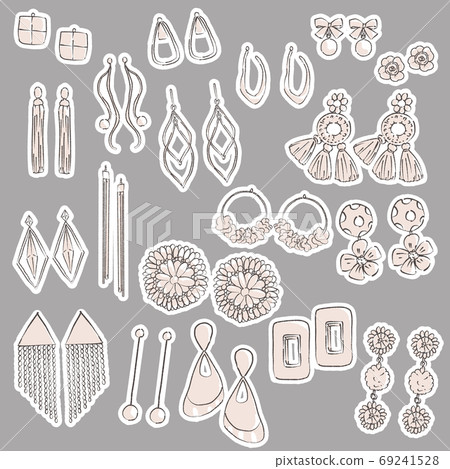 Earrings and earrings in various colors with solid background 69241528