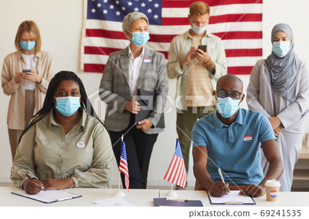 Group of People Voting at Polling Station 69241535