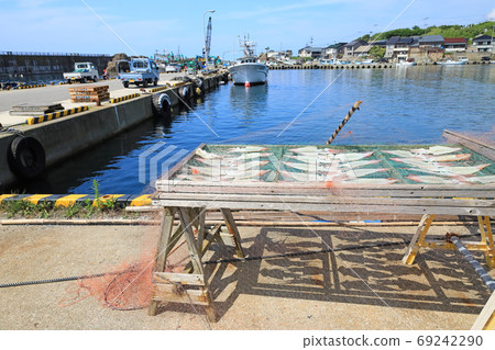 Sadogashima fishing port, Himezu port and squid sun dried 69242290