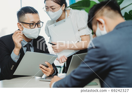 People working in new normal, after pandemic People working in new normal, after pandemic 69242327