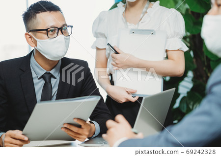 People working in new normal, after pandemic People working in new normal, after pandemic 69242328