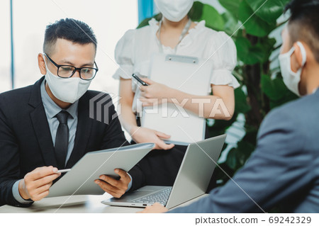 People working in new normal, after pandemic People working in new normal, after pandemic 69242329