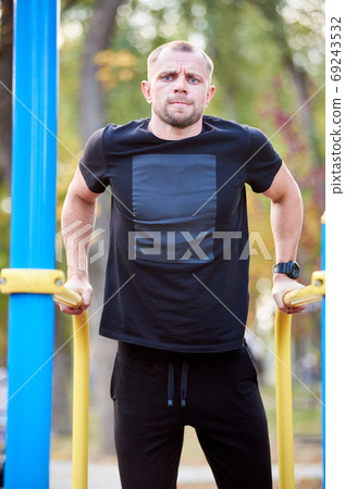 Active family time at the outdoor gym 69243532