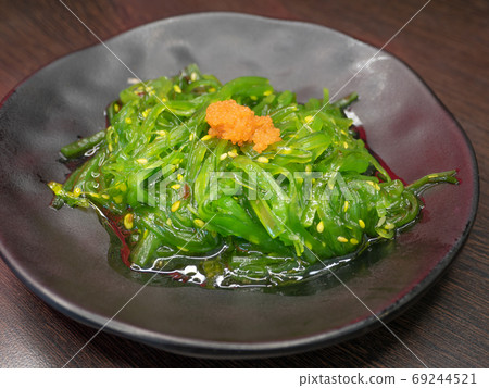 Hiyashi wakame chuka with shrimp eggs Hiyashi wakame chuka with shrimp eggs 69244521