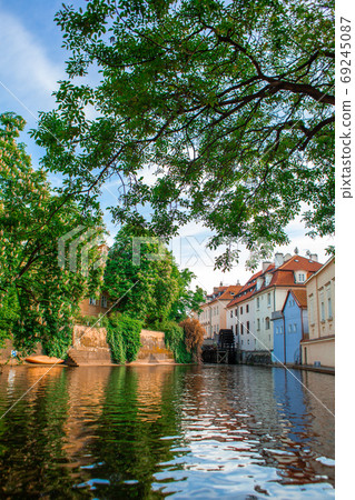 The architecture of the strago city of Prague. River channel in the city. Streets of old Europe, cityscape 69245087