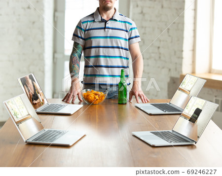 Virtual talking with friends, celebrating and drinking alcohol. All the meetings coming to remote way during coronavirus quarantine 69246227