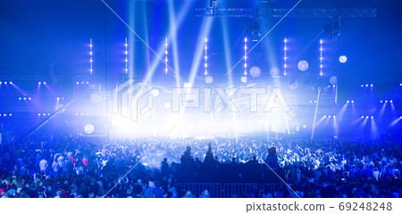 Stage illuminated by beautiful rays of lighting equipment. Stage illuminated by beautiful rays of lighting equipment. 69248248