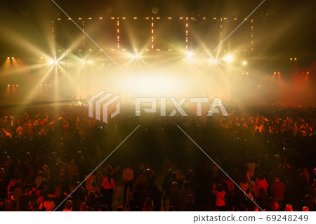 Stage illuminated by beautiful rays of lighting equipment. Stage illuminated by beautiful rays of lighting equipment. 69248249