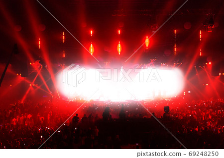 Concert crowd having fun at a rock concert. 69248250