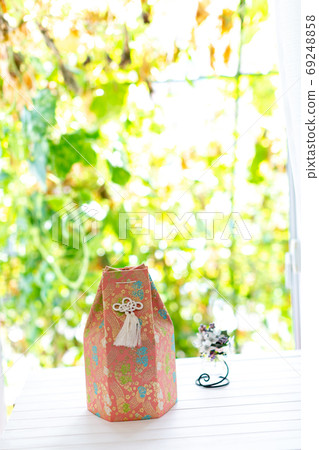 The remains of a dog, a funeral urn, a bone The remains of a dog, a funeral urn, a bone 69248858