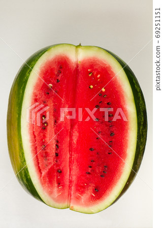 Sliced ripe watermelon on white background, top view Sliced ripe watermelon on white background, top view 69251151