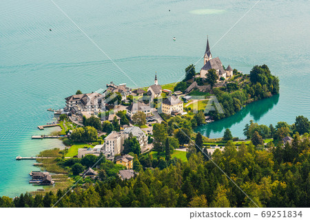 View of the Worthersee lake with Maria Worth church, Carinthia, Austria 69251834