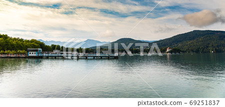 Panorama view at Worthersee lake in Klagenfurt in carinthia, Austria. Panorama view at Worthersee lake in Klagenfurt in carinthia, Austria. 69251837