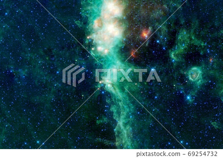 A beautiful green galaxy in deep space. Elements of this image were furnished by NASA. A beautiful green galaxy in deep space. Elements of this image were furnished by NASA. 69254732