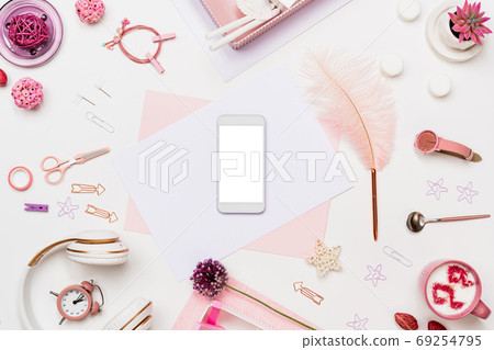 Flat lay desk composition with phone, paper page Flat lay desk composition with phone, paper page 69254795