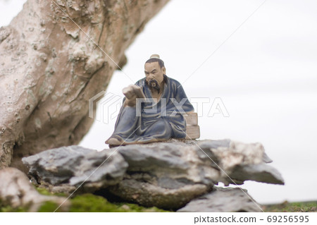 a Bonsai and Penjing landscape with miniature. 69256595