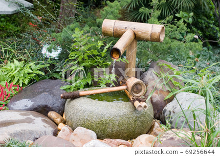 Stone rock in a Japanese Buddhist temple garden. 69256644