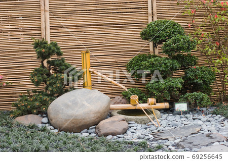 Stone rock in a Japanese Buddhist temple garden. Stone rock in a Japanese Buddhist temple garden. 69256645