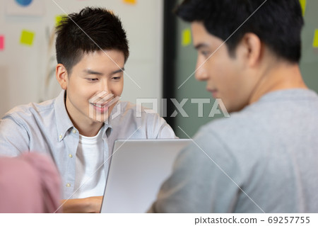 Business man and woman meetting talk about job for branding in o Business man and woman meetting talk about job for branding in o 69257755