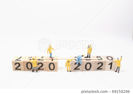 New year 2020 change to 2021 concept, with small figure New year 2020 change to 2021 concept, with small figure 69258206