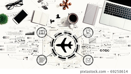 Flight ticket booking concept with a laptop computer Flight ticket booking concept with a laptop computer 69258614
