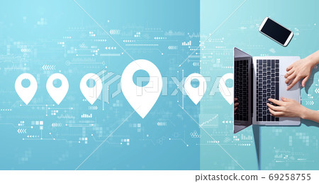 Map pin concept with person working with laptop 69258755