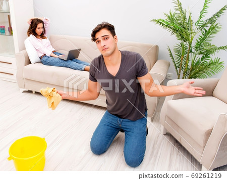 Young family doing cleaning at home 69261219