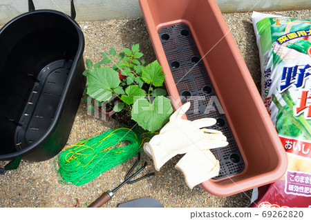 Preparing to grow planter plants on the balcony 69262820