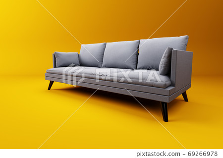 grey couch yellow pillows