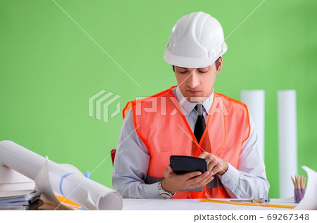 Man architect working on the project Man architect working on the project 69267348