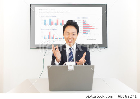 Businessman making a video call 69268271