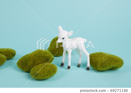 minimal white baby deer and moss 69271186