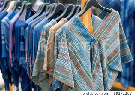 Close up T-shirt Indigo clothing is hand-woven in clothes rack a Close up T-shirt Indigo clothing is hand-woven in clothes rack a 69271298