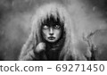 A girl with one eye stands in the gloom and looks frighteningly. 69271450