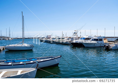 fishing boats moored in a pier mediterranean sea dock 69271735