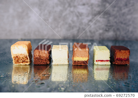 Chocolate cake cut on a mirror surface 69272570