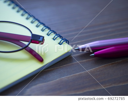Business image · notebook · glasses · women Business image · notebook · glasses · women 69272785