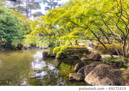 Blue sky and Japanese garden pond Blue sky and Japanese garden pond 69272819