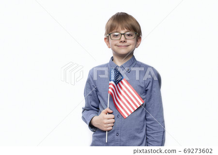 Teenager holding flag of America. Education in the USA. Training in United States. Teenager holding flag of America. Education in the USA. Training in United States. 69273602