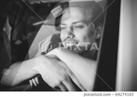 Close up side portrait of happy caucasian man Close up side portrait of happy caucasian man 69274185
