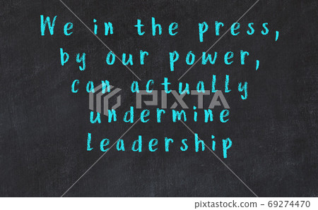 Chalk wise inscription on black chalkboard 69274470