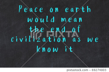 Chalk wise inscription on black chalkboard 69274803