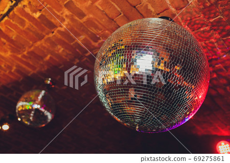 Colorful disco mirror ball lights night club background. 69275861