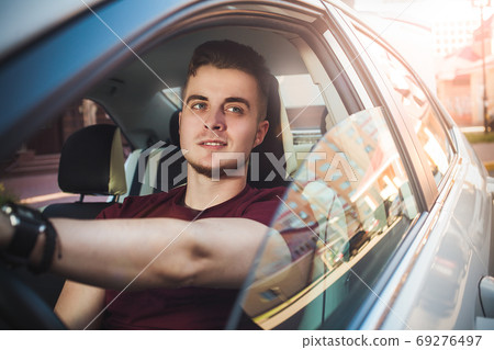 Close up side portrait of happy caucasian man 69276497