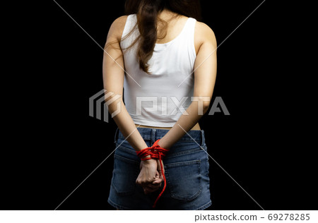 Victim women tied up with red rope 69278285