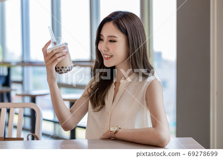 asian woman drink bubble tea asian woman drink bubble tea 69278699